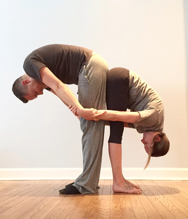 Easy 2 Person Yoga Poses - Partner Forward Fold