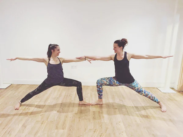 Medium 2 Person Yoga Poses to Do with Your BFF - Partner Warrior 2